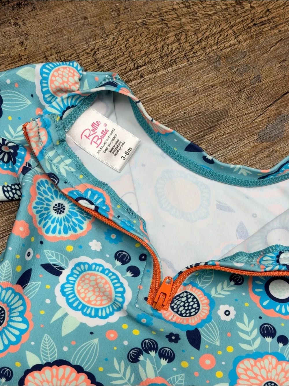 Ruffle Butts long Sleeve Floral One-Piece Swimsuit- size 3-6 months